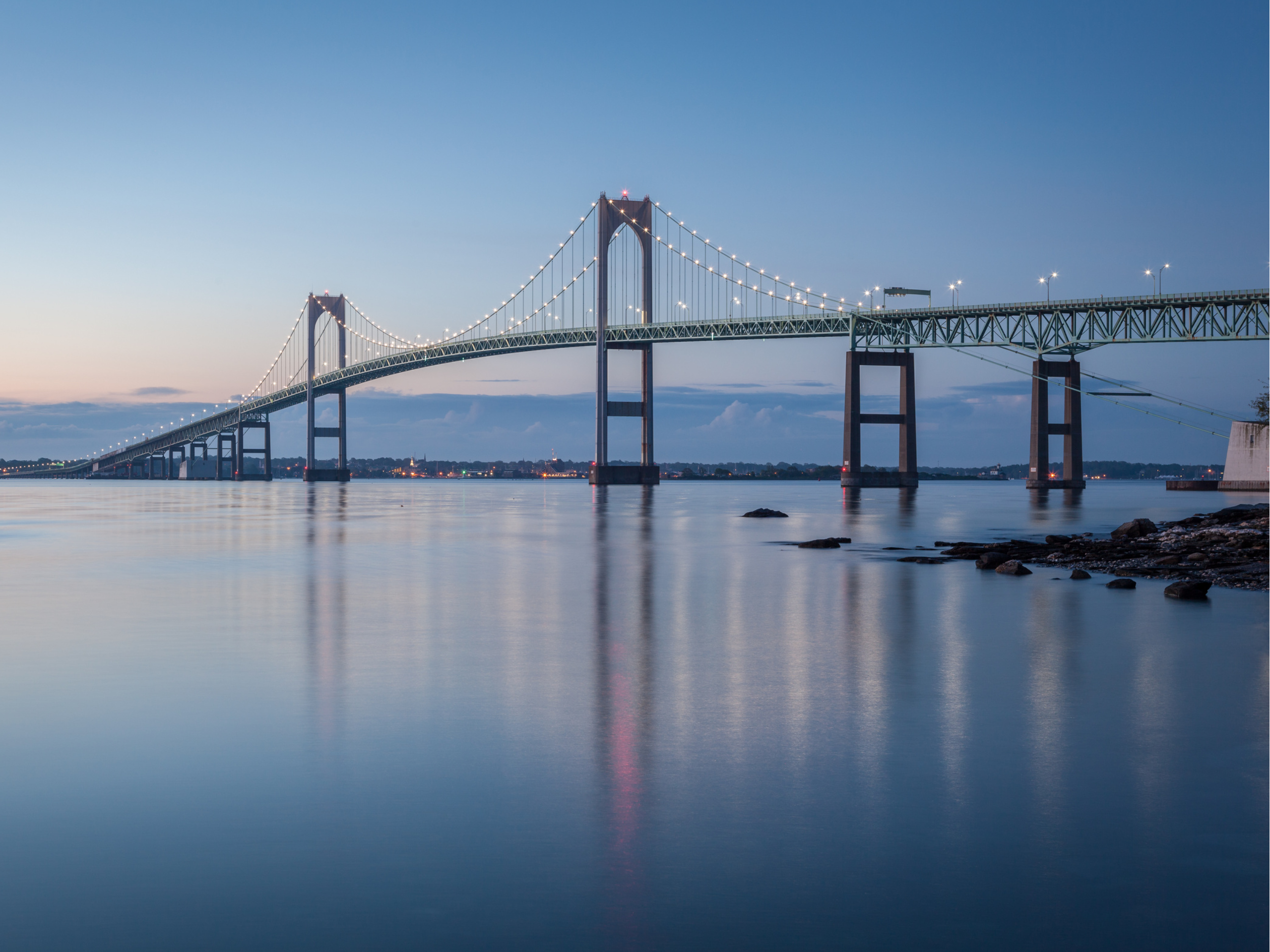 Newport Rhode Island Cliff Walk and Pell Bridge luxury coastal real estate