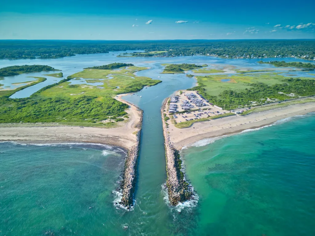 Aerial view of Charlestown Breachway and coastal real estate in Rhode Island
