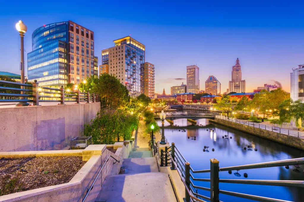 Providence Rhode Island East Side luxury homes and Waterplace Park skyline at twilight